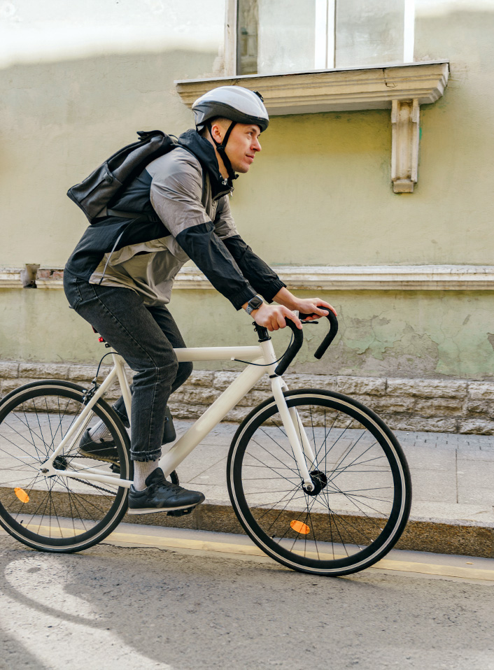 Man commuting to work on boke